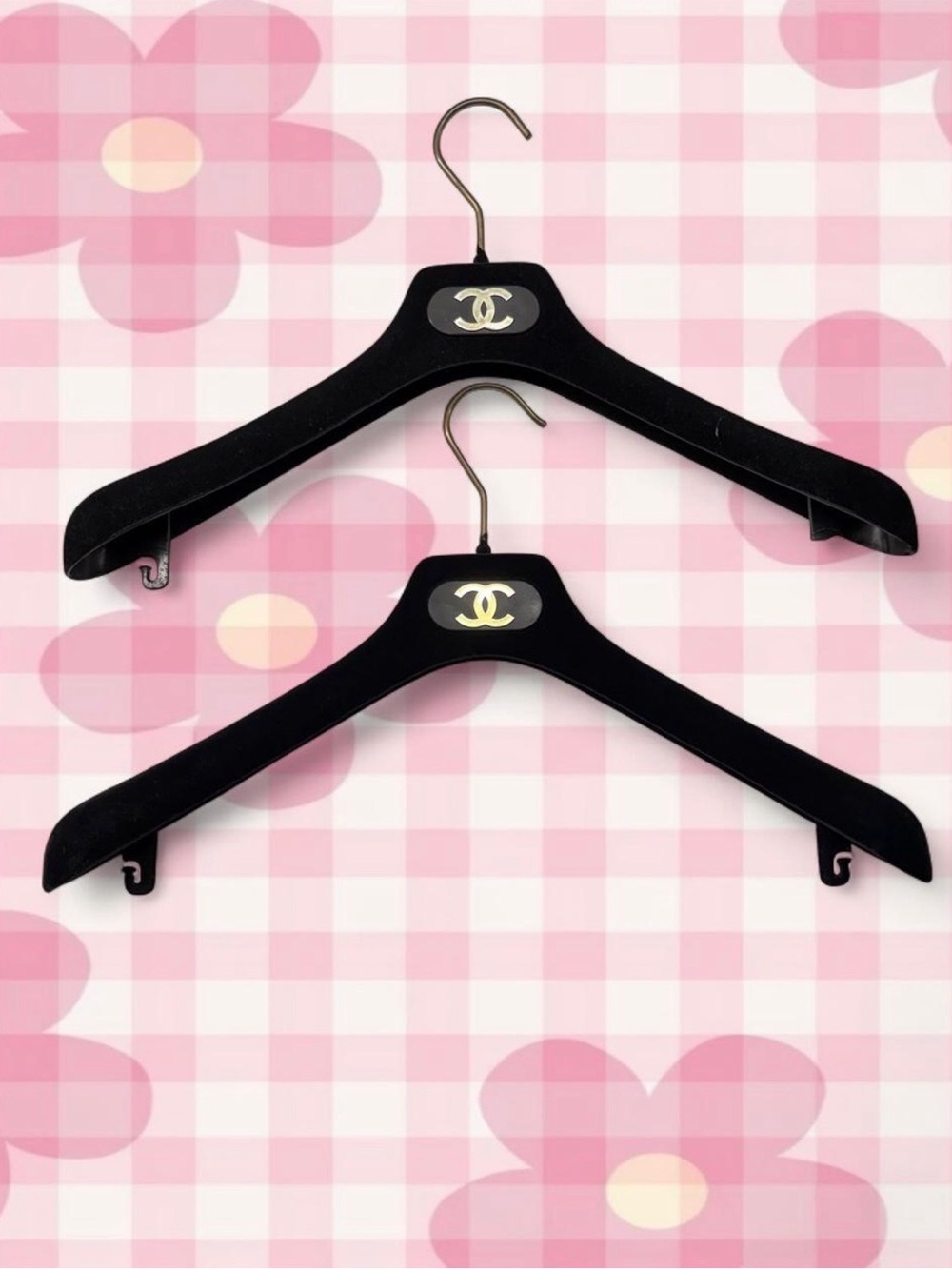 Chanel black velvet hangers with gold logo